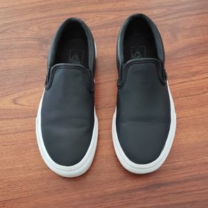 Vans black classic slip on